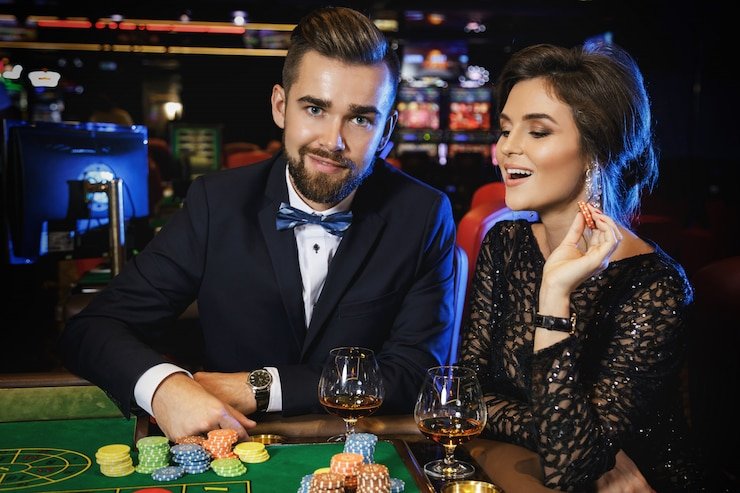 Antarmuka permainan Big Bass Bonanza di harmonibet menampilkan gulungan slot dengan simbol ikan berwarna-warni